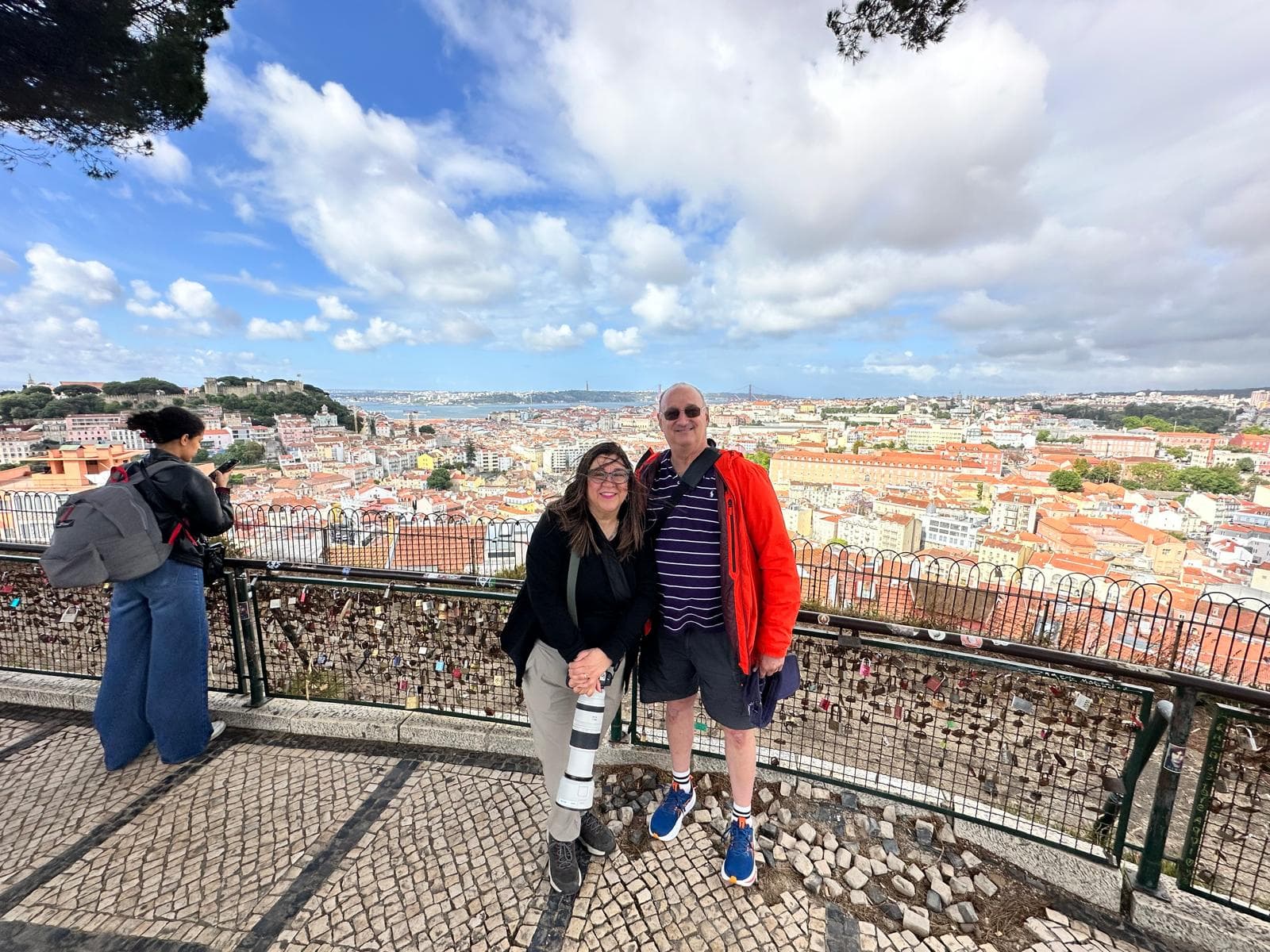 Travel-Luck travelers at a panoramic city viewpoint